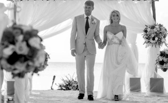 Colleen Rowland with her husband Aaron Ramsey on their wedding destination.